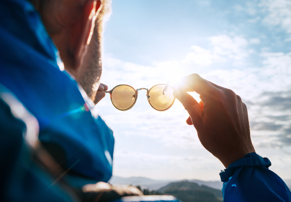 Why is wearing sunglasses so important for UV protection?